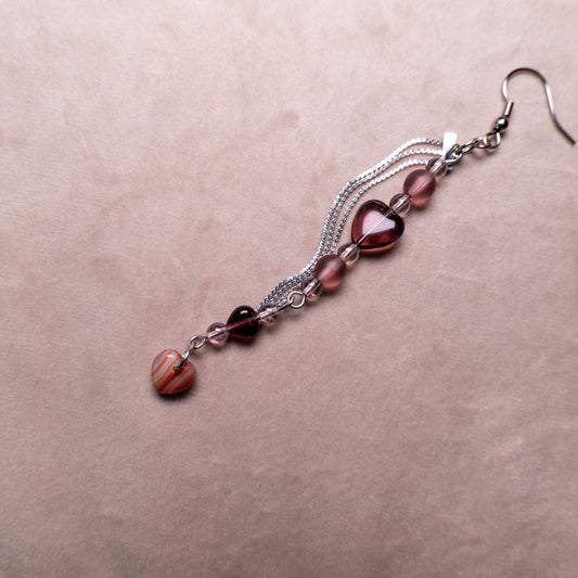 Oorbellen met paarse hartjes