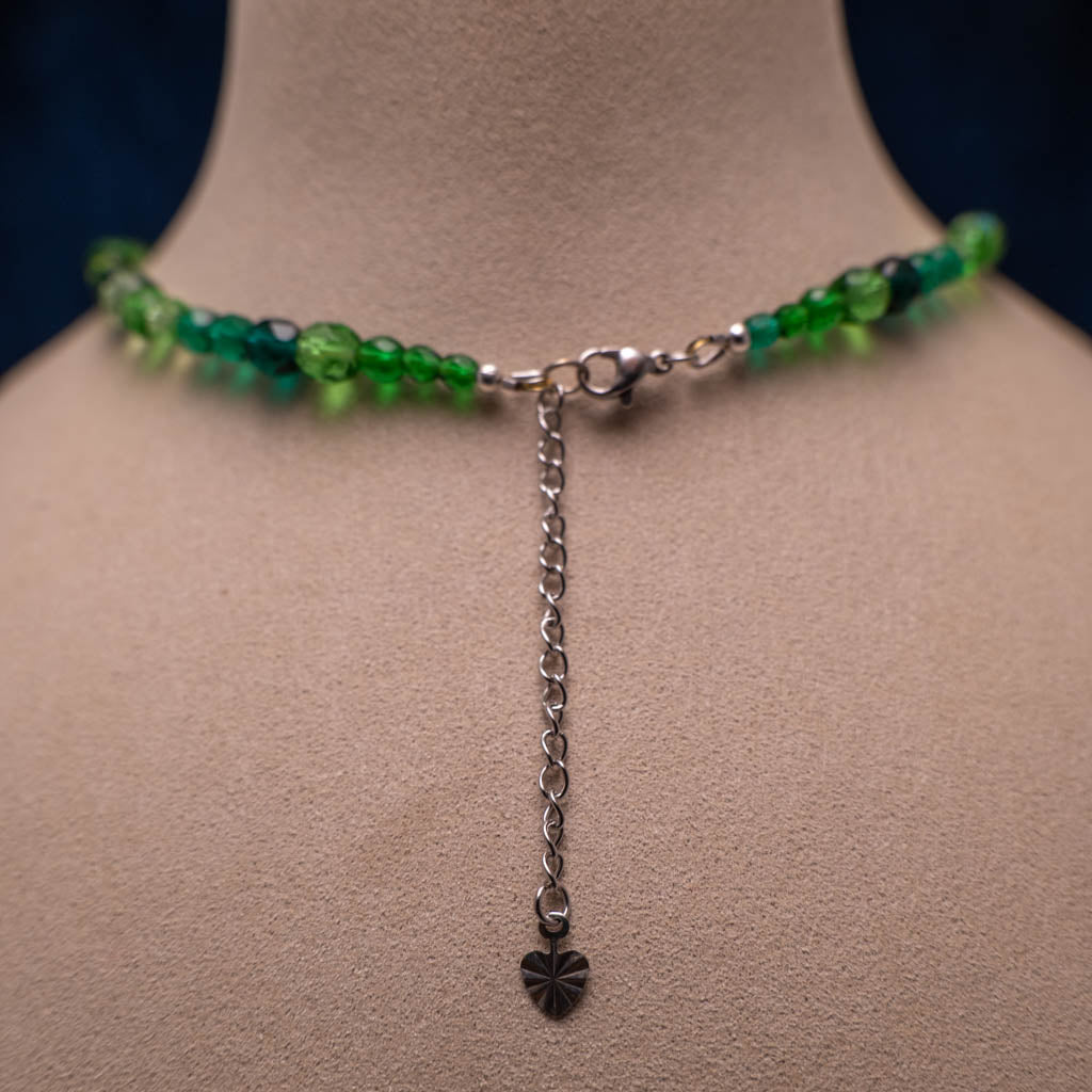 Necklace with green faceted glass beads