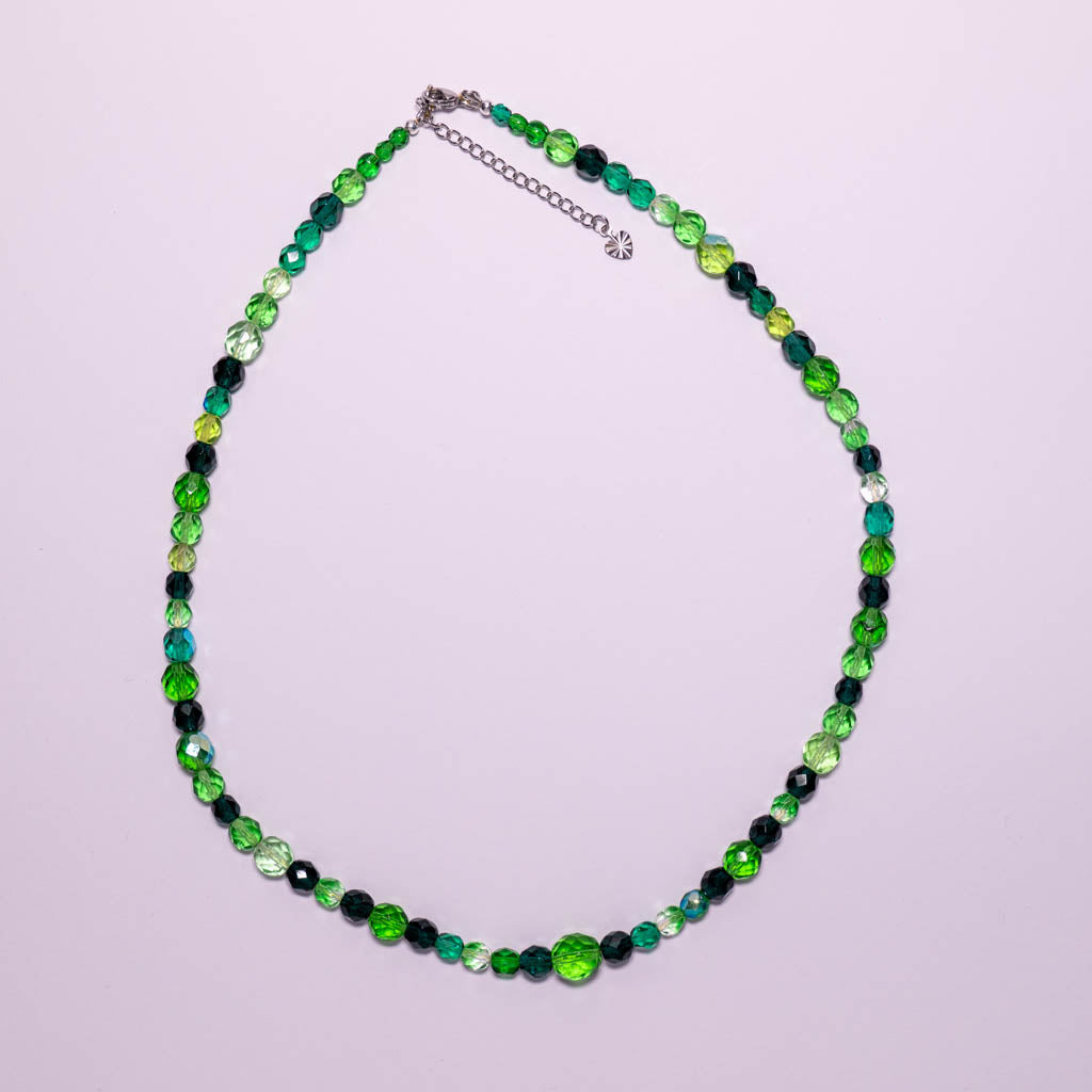 Necklace with green faceted glass beads