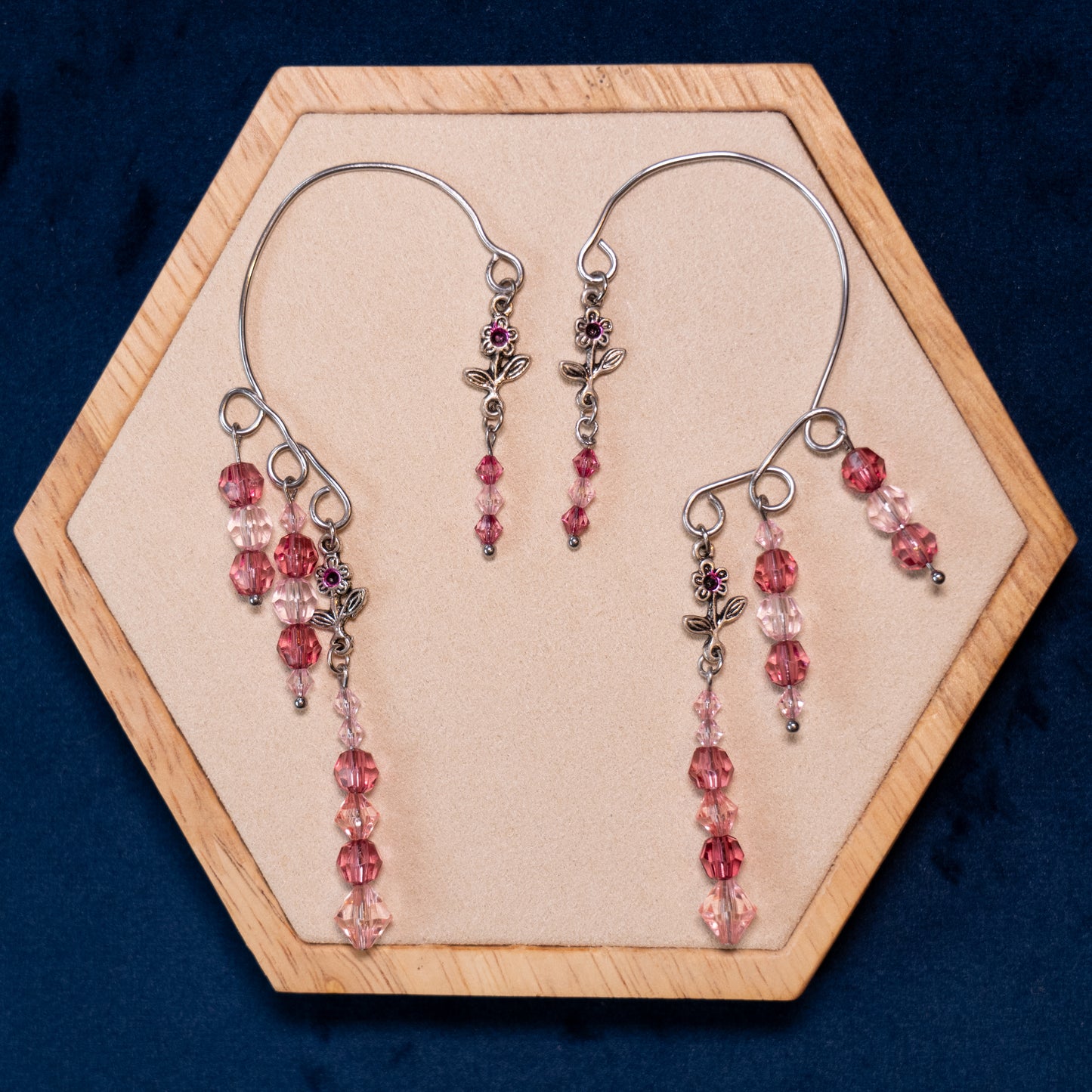 Pink ear cuffs with flower detail