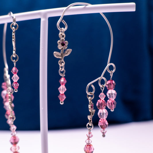 Pink ear cuffs with flower detail
