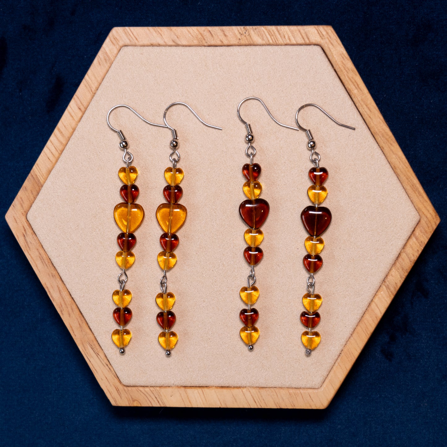 Title: Earrings with heart beads in brown and orange