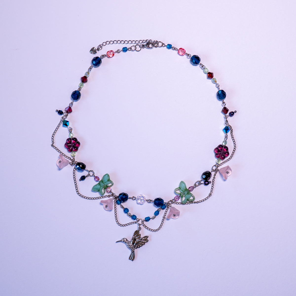 Ketting met kolibrie en bloemkralen