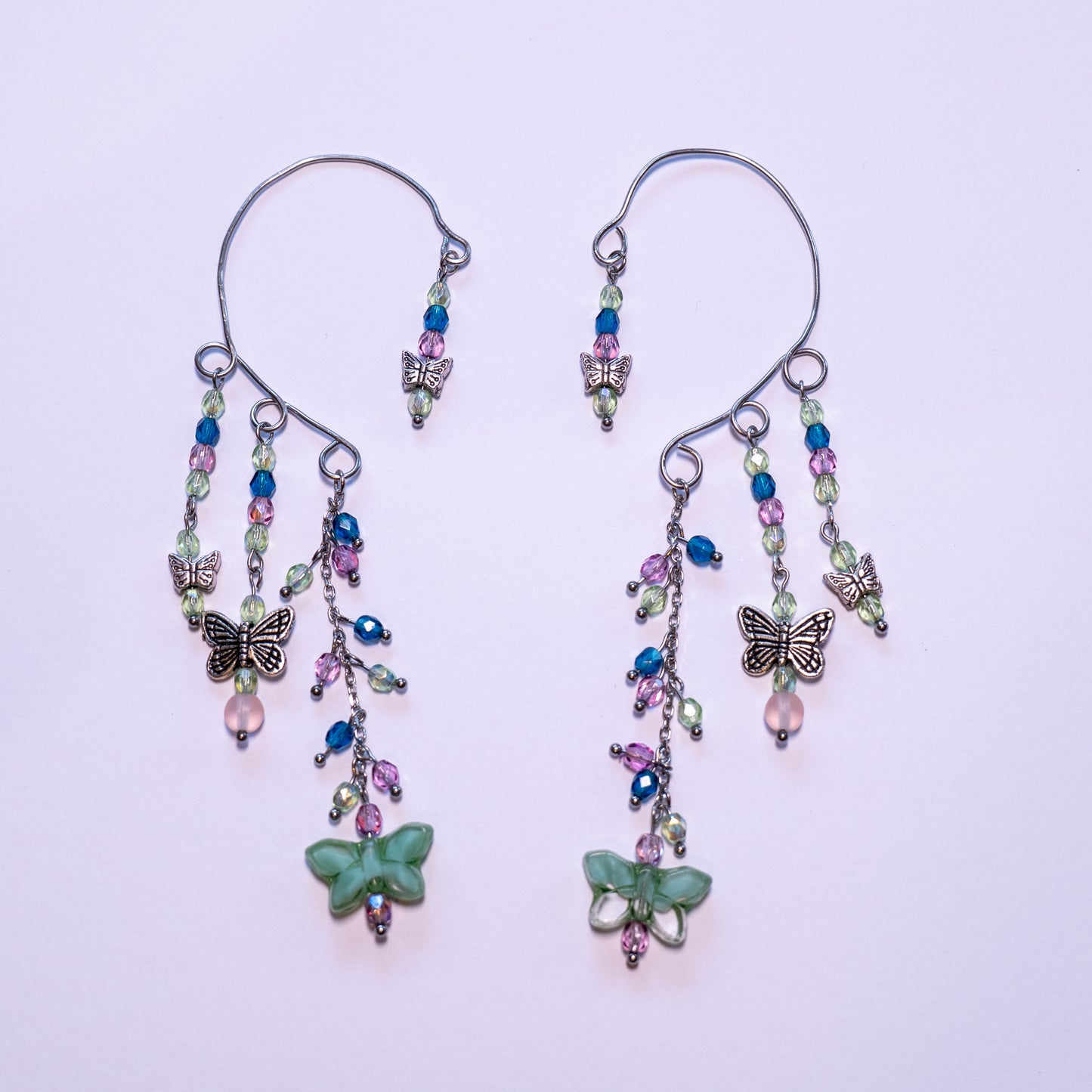 Ear cuffs with green butterflies