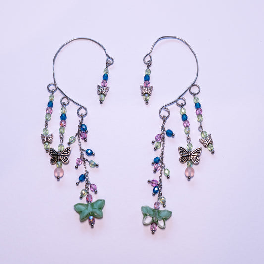 Ear cuffs met groene vlinders