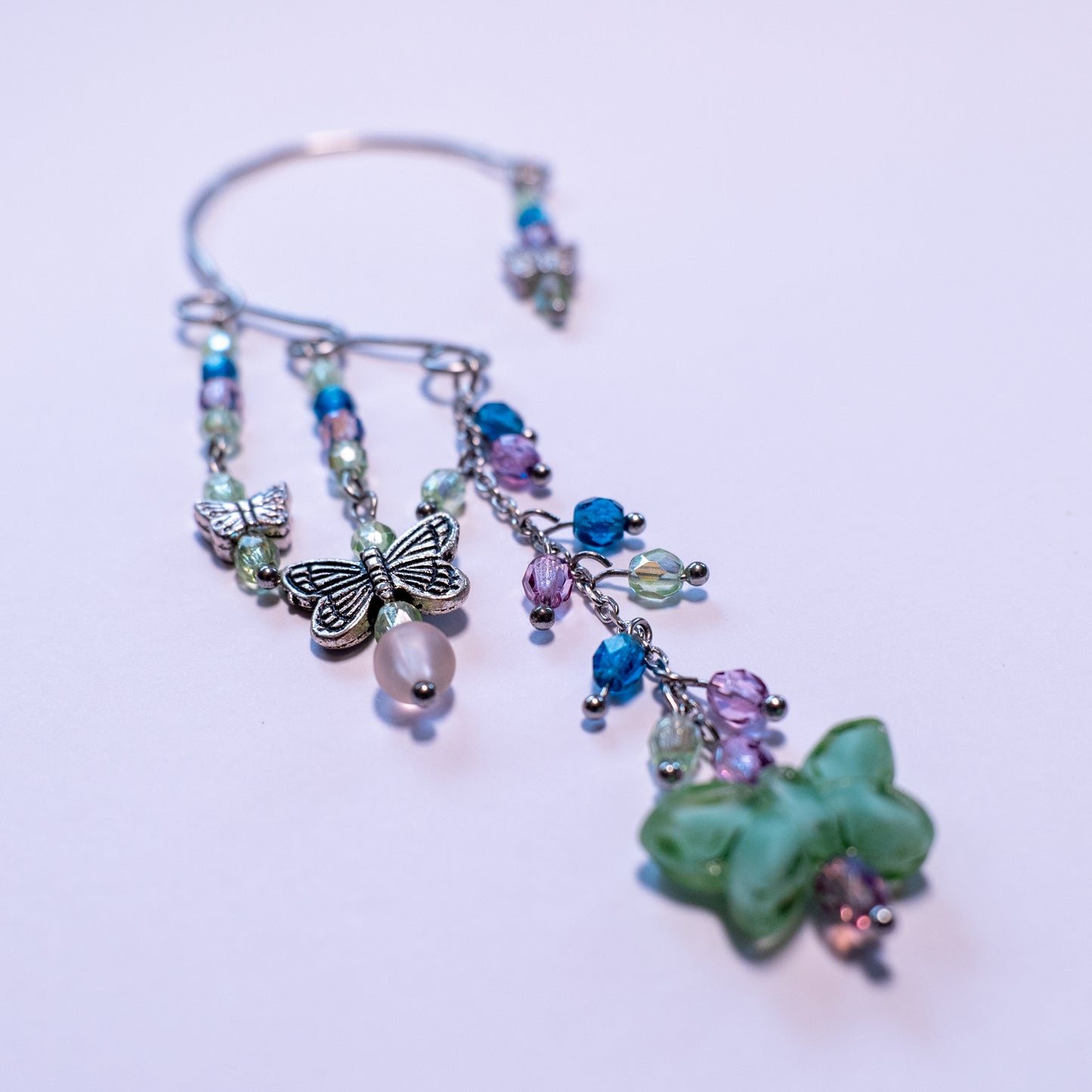 Ear cuffs with green butterflies