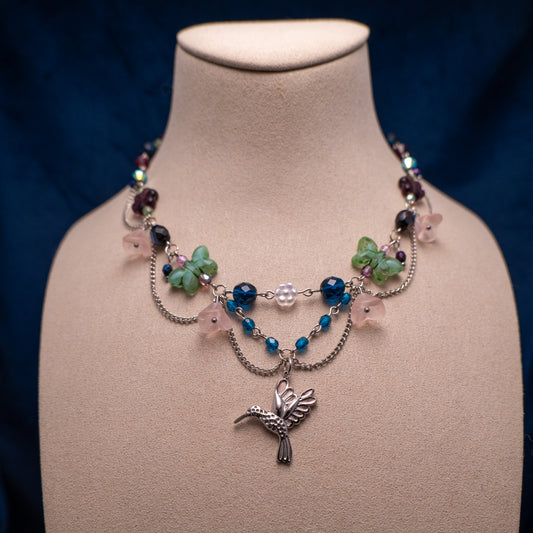 Ketting met kolibri en bloemkralen