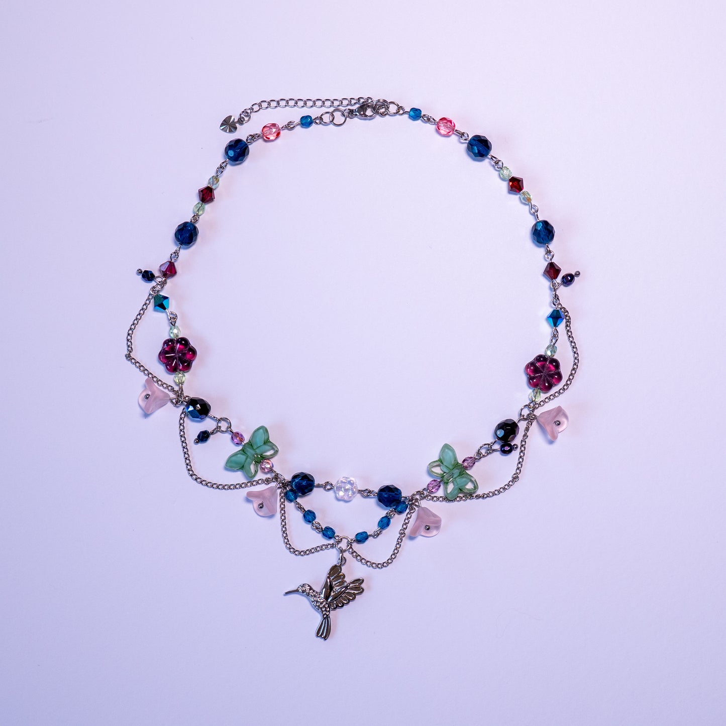 Ketting met kolibrie en bloemkralen