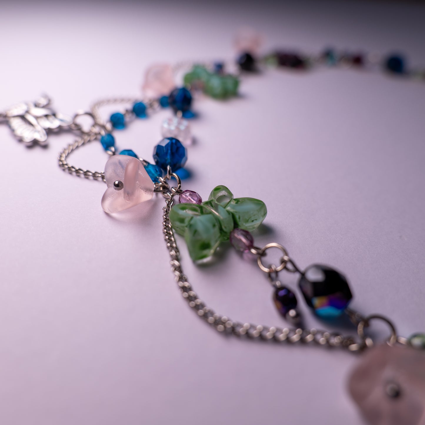 Ketting met kolibrie en bloemkralen