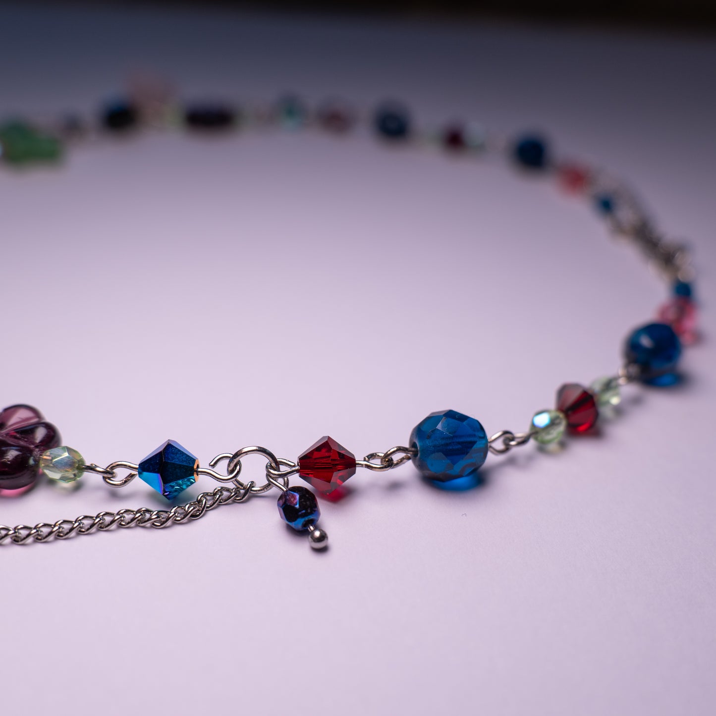 Ketting met kolibrie en bloemkralen